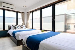 Postel nebo postele na pokoji v ubytování Ueno Woo Hotel + 33 fotografií