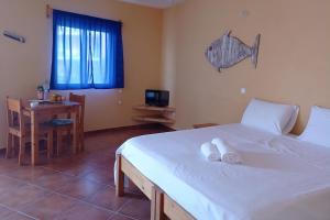 Ein Bett oder Betten in einem Zimmer der Unterkunft Appartamento BICA. Stella Maris Exclusive