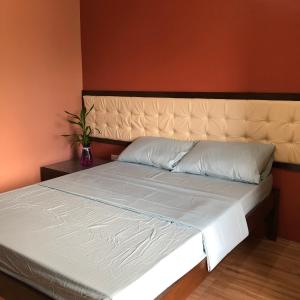 Ένα ή περισσότερα κρεβάτια σε δωμάτιο στο Alona Princess Suites