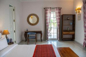 Postel nebo postele na pokoji v ubytování Naila Kothi - A Luxury Boutique Royal Suites in Jaipur