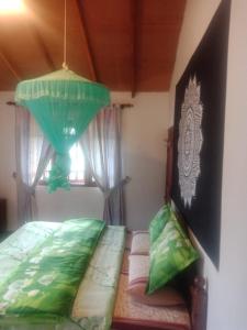 Letto o letti in una camera di Cozy Heaven