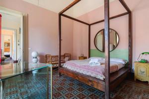 Posteľ alebo postele v izbe v ubytovaní La Cot B&B