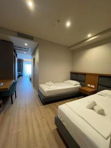 Postel nebo postele na pokoji v ubytování AMR Hotel - Durres