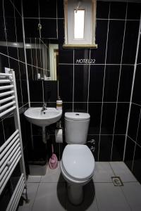 a bathroom with a toilet and a sink at 22 OTEL in Edirne