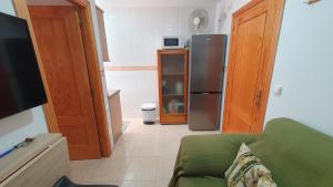 Telewizja i/lub zestaw kina domowego w obiekcie Rico Apartaments Ricosol