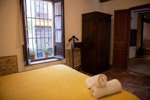 A bed or beds in a room at CASA NICOLE Naturaleza, Montañas y Piscina Privada en Alicante