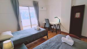 Una cama o camas en una habitación de STAY Virtuoso Apartment Nicosia