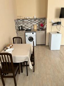 A kitchen or kitchenette at Apartment near Tskaltubo spa restort
