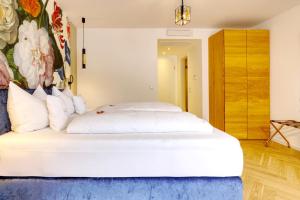 Postel nebo postele na pokoji v ubytování Hotel Lipmann "Am Klosterberg"