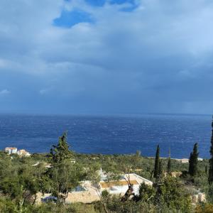 a view of the ocean from a hill at Sea View Land for Rent in Agios Nikolaos