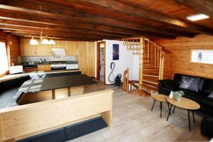 Kuchyň nebo kuchyňský kout v ubytování Chalet Heimeli