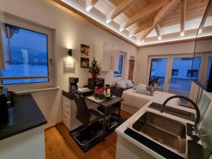 Posedenie v ubytovaní Golf & Ski Appartements Mittersill Trausmuth Monika inkl Sommercard - Golfplatz 500 m entfernt, inkl Waschmaschine, Trockner