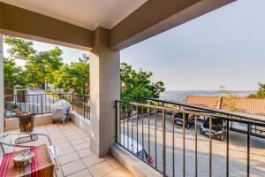a balcony with a view of the street at Salty Soul Studio 70 in Roodepoort