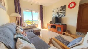 Telewizja i/lub zestaw kina domowego w obiekcie Rico Apartaments Ricosol