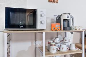 Kuchyň nebo kuchyňský kout v ubytování [10 min Torino] Moderna Casa Due Piani con Cortile + 18 fotografií