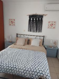 En eller flere senge i et værelse på Anastasia's garden house