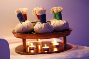 a group of pumpkins with candles on a table at Hotel Incontro in Ariano Irpino