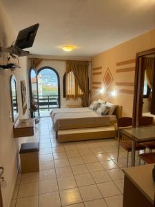 Ένα ή περισσότερα κρεβάτια σε δωμάτιο στο Villa Memories