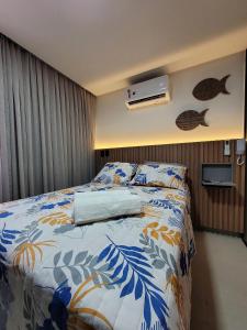 Postel nebo postele na pokoji v ubytování Studio Aconchegante no Bessa