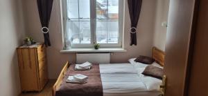 Postel nebo postele na pokoji v ubytování Willa Nad Białką