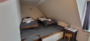 Postel nebo postele na pokoji v ubytování Willa Nad Białką