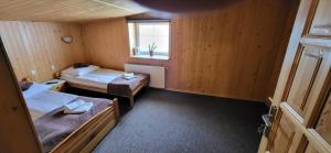 Postel nebo postele na pokoji v ubytování Willa Nad Białką