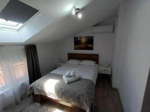 En eller flere senge i et værelse på Old Town Studio 1 Apartment nr 3