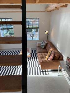 Postel nebo postele na pokoji v ubytování trendy boutique appartement vlak bij Amsterdam