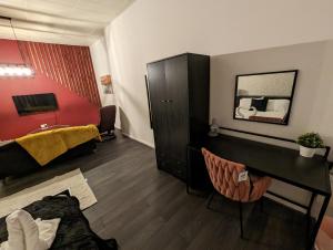 Μια τηλεόραση ή/και κέντρο ψυχαγωγίας στο Cozy 1 Bed Apartment with Kitchen in Town