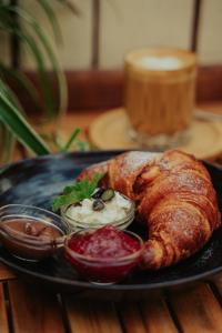 a plate of food with a turkey and sauce at Apartmány J&J in Šumperk