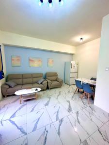 Posezení v ubytování 睡飽飽民宿 Sleeping Well B&B 全新電梯民宿
