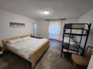 Posteľ alebo postele v izbe v ubytovaní Appartamenti Bice Abetone 1