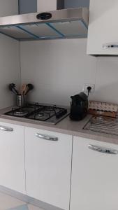 Ett kök eller pentry på Appartamento La casa di Nica