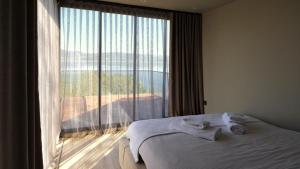 Cama o camas de una habitación en Velour Hotel Spa Restaurant