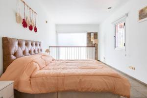Ένα ή περισσότερα κρεβάτια σε δωμάτιο στο Simplemente Mendoza ! Unica !