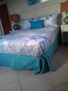Łóżko lub łóżka w pokoju w obiekcie Villa Mares en Playa Bonita ,coson Las Terrenas