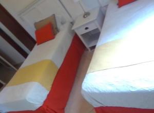 a small room with a bed and a desk at Villa Mares en Playa Bonita ,coson Las Terrenas in Cosón