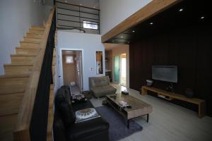 TV a/nebo společenská místnost v ubytování The Ocean Pension