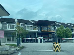 an apartment building with a police tape around it at HANZ HOMESTAY MELAKA 3 - For Muslim in Melaka