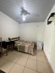 Postel nebo postele na pokoji v ubytování Pouso da Celeste - Trindade