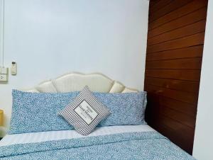 Säng eller sängar i ett rum på Ree Guesthouse