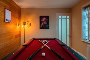 a billiard room with a pool table at Airport Haven: Pool Table, Games Room, Sleeps 9 in Thorley