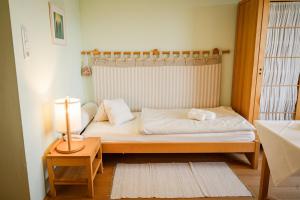 Postel nebo postele na pokoji v ubytování Panoramahotel Wagner - Das Biohotel am Semmering