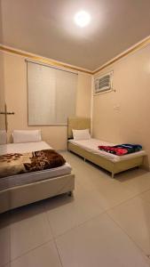 Ark Chalet tesisinde bir odada yatak veya yataklar