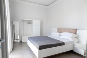 Posteľ alebo postele v izbe v ubytovaní Bottego24 Suite, Apartment & Terrace + 37 fotografií
