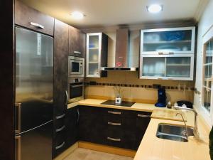 Kuchyň nebo kuchyňský kout v ubytování Casa Rural confortable