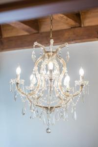 a chandelier hanging from a ceiling at Residenza Duomo3 - Apartments in Verona
