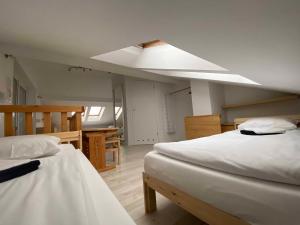 מיטה או מיטות בחדר ב-Kleine schöne Doppelhaushälfte
