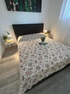 Postel nebo postele na pokoji v ubytování Punta Prima Palm Beach Apartment + 23 fotografií