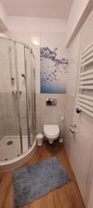 Kúpeľňa v ubytovaní Apartament na Heweliusza + 14 fotografií